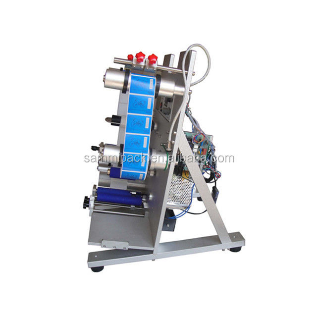 Máy dán nhãn chai tròn nhỏ giọt tai điện, bán tự động mới độc đáo với bộ phận động cơ lõi